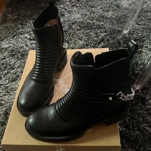 Christian Louboutin flat chain boot